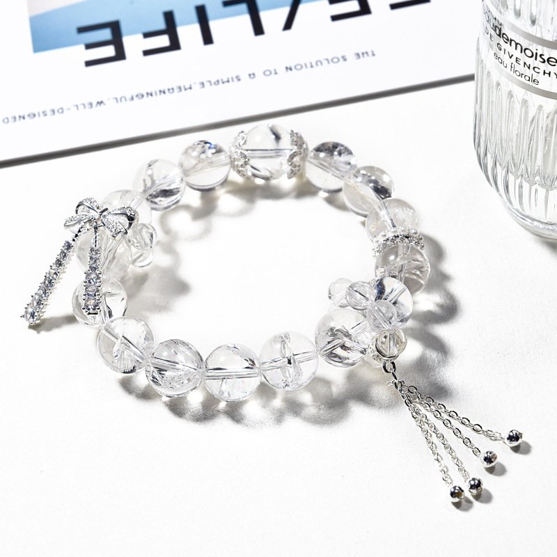 White Asai Crystal Bracelet with Butterfly Accent
