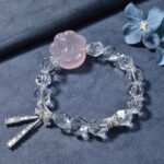 Faceted White Crystal Bracelet with Cat’s Paw and Butterfly Design