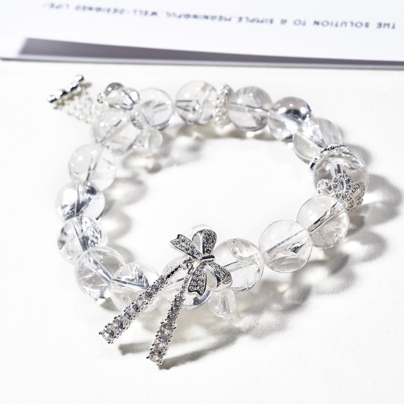 White Asai Crystal Bracelet with Butterfly Accent
