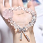 Faceted White Crystal Bracelet with Cat’s Paw and Butterfly Design