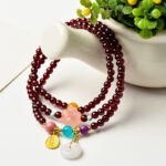 Triple Strand Garnet Crystal Bracelet with Rose Quartz