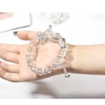 White Asai Crystal Bracelet with Butterfly Accent