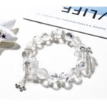 White Asai Crystal Bracelet with Butterfly Accent