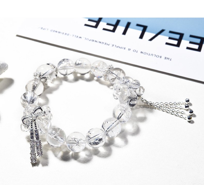 White Asai Crystal Bracelet with Butterfly Accent